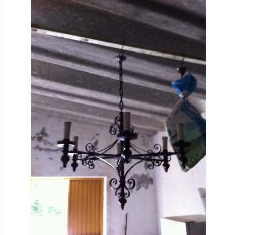 Candeeiro castiçal  antigo em ferro forjado