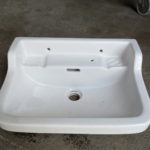 A fábrica teria sido instituída em 1850 (pelo menos, assim o indicava um dos painéis de azulejos colocados à entrada da fábrica, e que foi visível até meados da década de 1990), por Manuel Joaquim Afonso; contudo esta data não se apresenta como consensual, pois parece só ter começado a laborar em 1856. Nos anos em que esteve à frente da fábrica, Manuel Joaquim Afonso teve que fazer face a diversos problemas financeiros, pelo que entre 1861 e 1863 a fábrica acabou por ser vendida a um inglês, John Stott Howorth, que introduziu novas técnicas de produção oriundas do Reino Unido. Em poucos anos, a Fábrica da Loiça tornava-se numa das mais importantes em Portugal no ramo da produção cerâmica, destacado-se pela produção de faiança fina baseada no caulino (uma argila com alto grau de pureza); o sucesso alcançado é tal que o rei D. Luís I confere a Howorth título nobiliárquico (Barão de Howorth de Sacavém), e ainda o privilégio de a fábrica se poder intitular Real Fábrica de Loiça de Sacavém. Para além disso, nos últimos anos da sua vida, o rei-consorte D. Fernando II executou e pintou várias peças cerâmicas na Fábrica, dada grande amizade que o unia ao Barão de Sacavém. À data da sua morte, em 1893, já a louça de Sacavém se achava fortemente implantada no mercado, rivalizando por exemplo com a Vista Alegre, de Ílhavo; no ano seguinte a baronesa Howorth de Sacavém estabeleceu uma sociedade em comandita com o antigo guarda-livros da fábrica, James Gilman, a qual assegurará a administração da mesma até à morte da Baronesa, em 1909, altura em que Gilman assume sozinho o governo da empresa. Mantém-se a aposta na ligação estratégica ao mercado inglês, tanto ao nível da exportação do produto final, como da aquisição de novas tecnologias para a fábrica – em 1912, por exemplo, é inaugurado um forno-túnel com 8 metros de altura e 85 metros de comprimento, obra de dimensões colossais, e onde pela primeira vez se utilizou betão armado em Portugal. A Fábrica de Loiça tornou-se numa das principais unidades fabris da cintura industrial da zona oriental de Lisboa (compreendida entre o Beato e Vila Franca de Xira), e o seu sucesso foi tal que conduziu ao aumento vertiginoso da população de Sacavém (que, por alturas da fundação da fábrica, teria pouco mais de 350 habitantes, tendo, porém, a partir de então aumentado a população da freguesia de uma forma constante e sustentada), sendo que em 1890, mais de metade dos quase 1890 habitantes da povoação tinham o seu emprego na Fábrica de Loiça. Muitos dos que aí trabalhavam eram oriundos de várias partes do País, que se deslocavam para a capital e zonas suburbanas na busca de melhores condições de vida. Dessa forma, numa povoação fortemente terciarizada, não é de estranhar que a maior parte dos habitantes fossem adeptos de doutrinas como o socialismo e o republicanismo, tendo-se desenvolvido fortemente o associativismo (é pelas mãos dos operários que nascem, por exemplo, a Cooperativa de Crédito e Consumo «A Sacavenense», no dia 31 de Janeiro de 1900, na comemoração dos nove anos da fracassada intentona republicana na cidade do Porto). Após o 5 de Outubro de 1910, e com o reconhecimento do direito à greve pelo Governo Provisório da República Portuguesa, sucedem-se as paralisações, tendo vários operários participado, por exemplo, nas greves de 1912, que forçaram o governo à detenção de algumas centenas de grevistas em vários fortes da cintura da capital, entre os quais o Forte de Sacavém. Nesse mesmo ano, formara-se o sindicato dos operários cerâmicos, havendo muitos filiados em Sacavém. Não obstante, talvez pela sua gerência inglesa, a Fábrica de Loiça de Sacavém foi pioneira em certas medidas que denotam a existência de preocupações sociais da parte do patronato: a criação de uma escola dentro da fábrica, a existência de um caixa de socorros mútuos para os seus trabalhadores, o direito a férias remuneradas, e a instituição de campos de férias para os filhos dos trabalhadores da fábrica. Nas primeiras décadas do século XX, o pintor Jorge Colaço executou na fábrica os azulejos para diversas das suas mais significativas obras: a Estação de São Bento, no Porto (1903), o Palace-Hotel do Buçaco, no Luso (1907), o Pavilhão dos Desportos, em Lisboa (1922), ou a Casa do Alentejo, também na capital. Em 1921, com a morte de James Gilman, sucede-lhe à frente da fábrica o seu filho Raul Gilman, tendo como sócio um outro inglês, Herbert Gilbert.